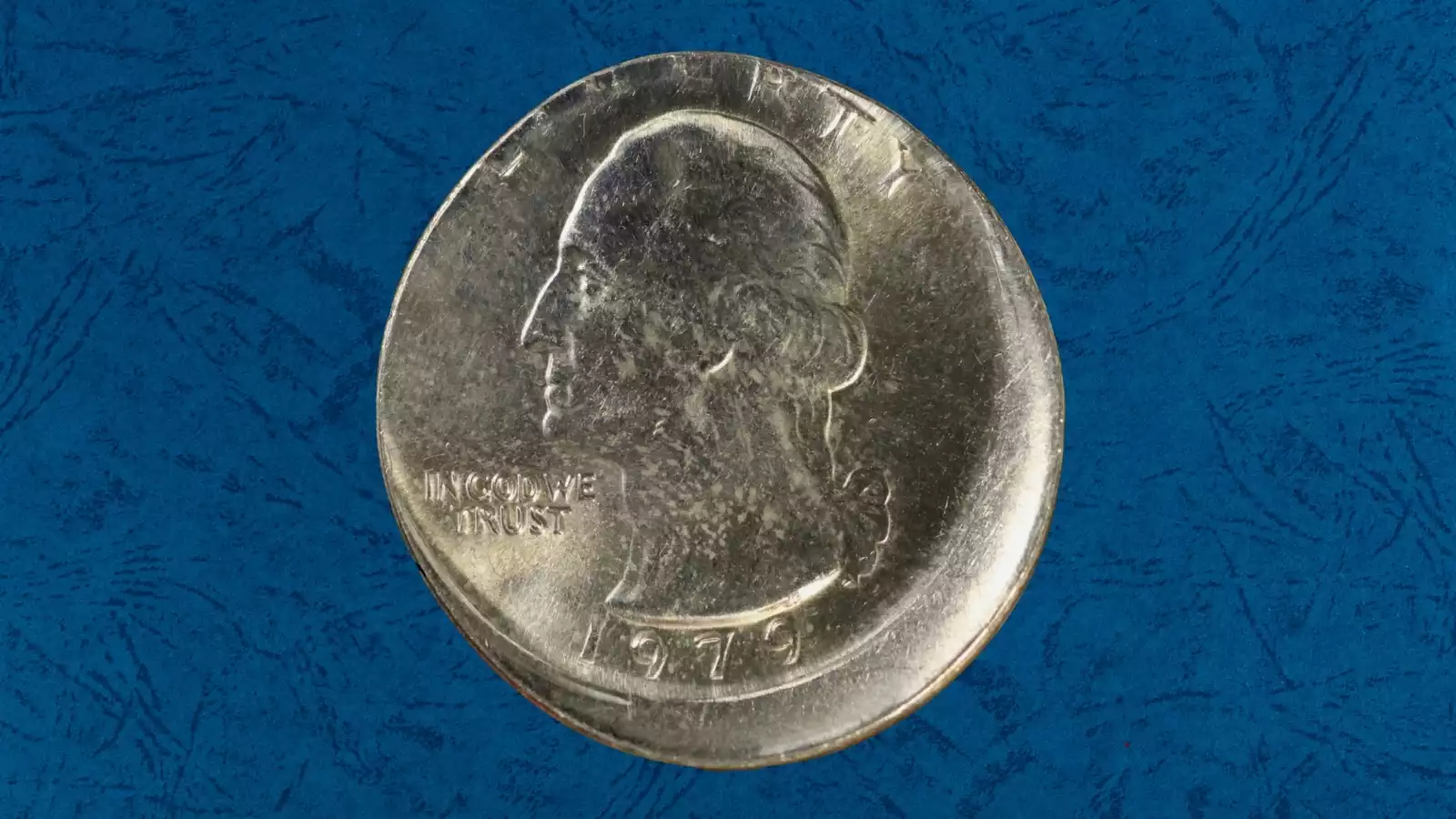 1979 Washington quarter off-center strike error showing blank crescent along one edge