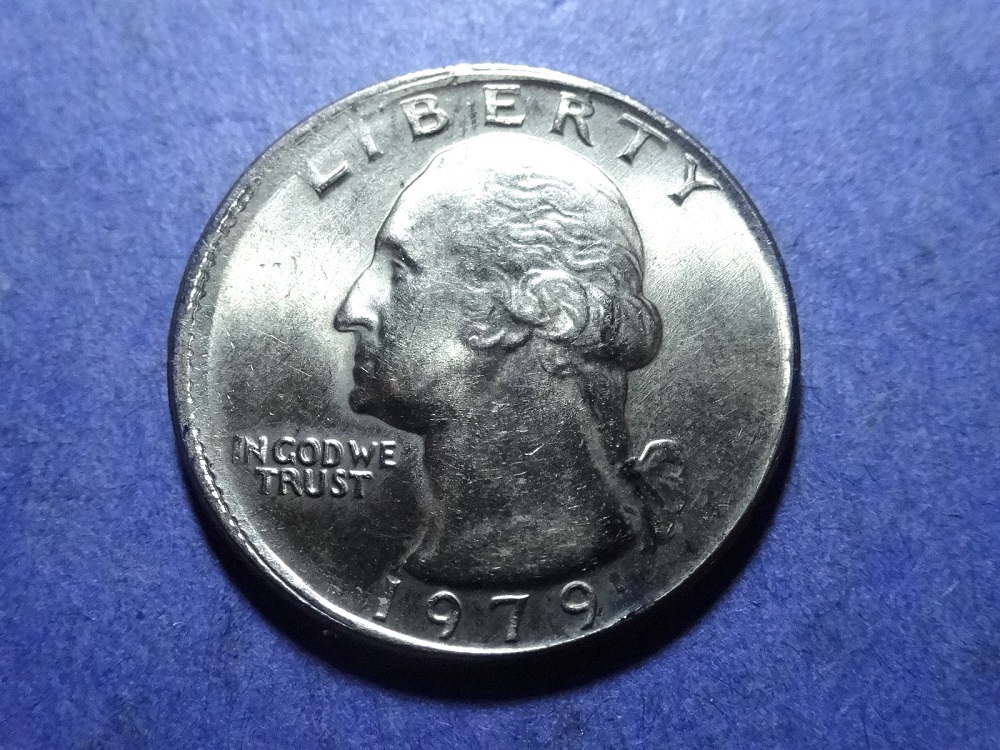 1979 Washington quarter broadstrike error showing expanded diameter and missing reeded edge